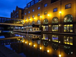 Enjoy a peaceful canal-side retreat with a balcony overlooking the serene water.