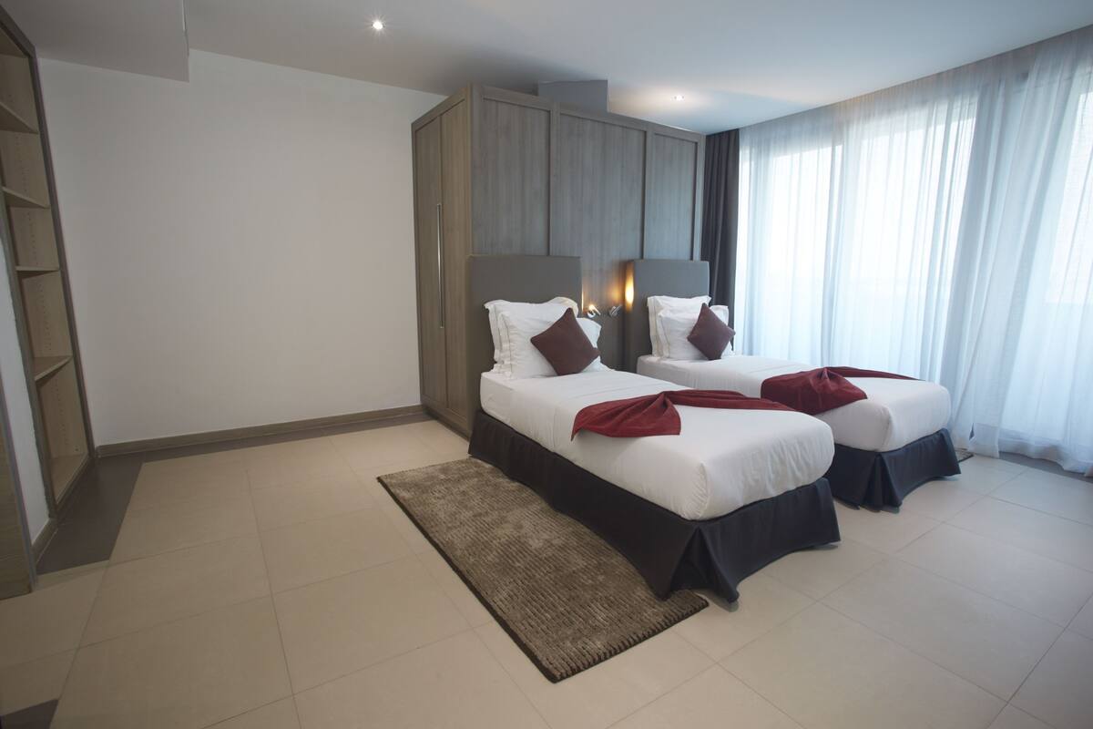 Appartement Deluxe, 2 chambres | Literie de qualité supérieure, coffres-forts dans les chambres, bureau